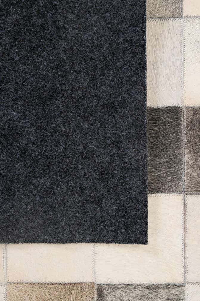 5' 1 x 7' 10 Cowhide - Patchwork Rug