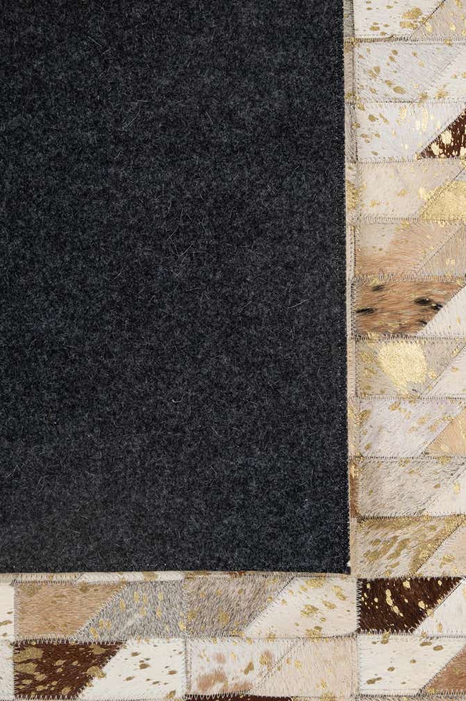 5' 2 x 7' 11 Cowhide - Patchwork Rug