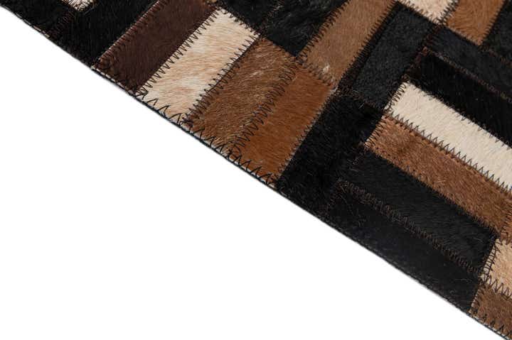 4' 11 x 7' 11 Cowhide - Patchwork Rug