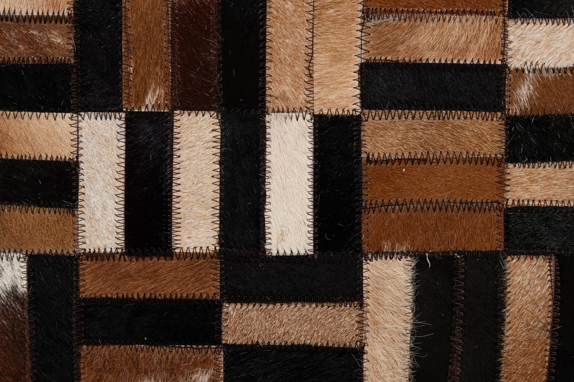 4' 11 x 7' 11 Cowhide - Patchwork Rug