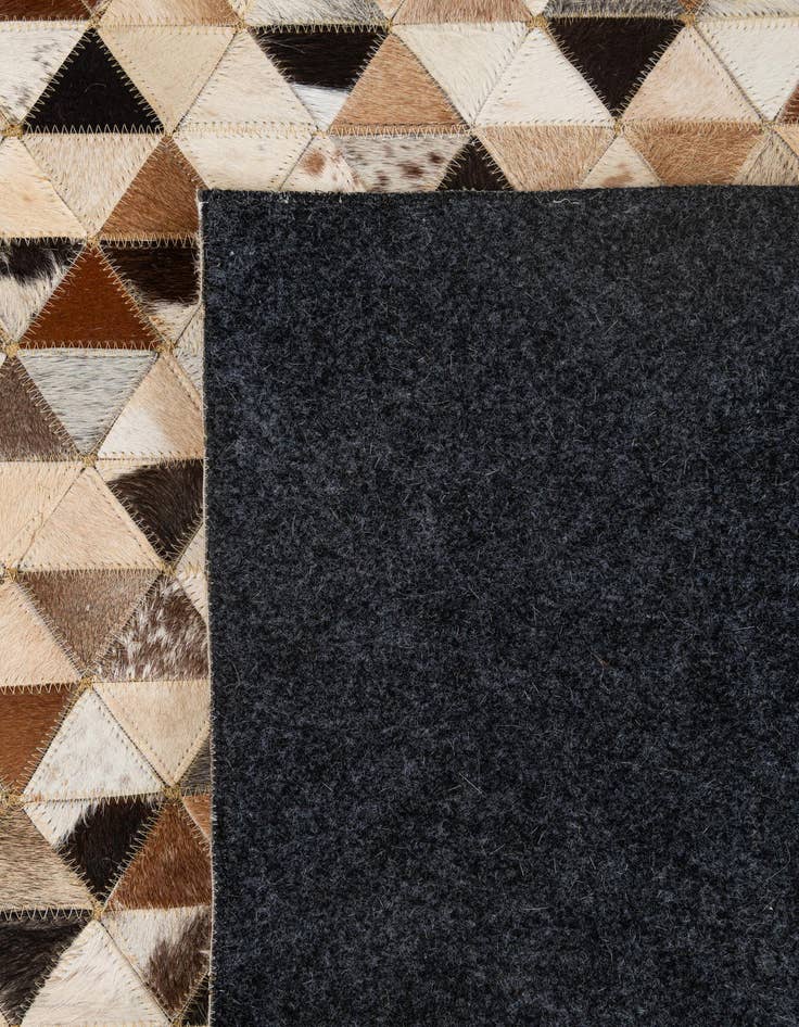 Detail image of 5' 1 x 7' 11 Cowhide - Patchwork Rug