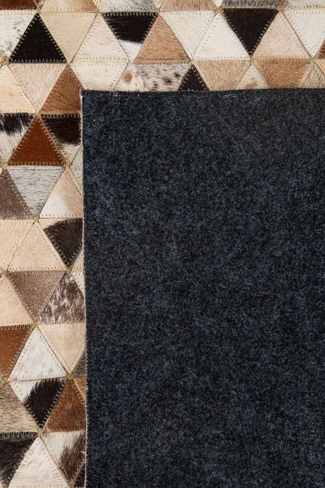 5' 1 x 7' 11 Cowhide - Patchwork Rug