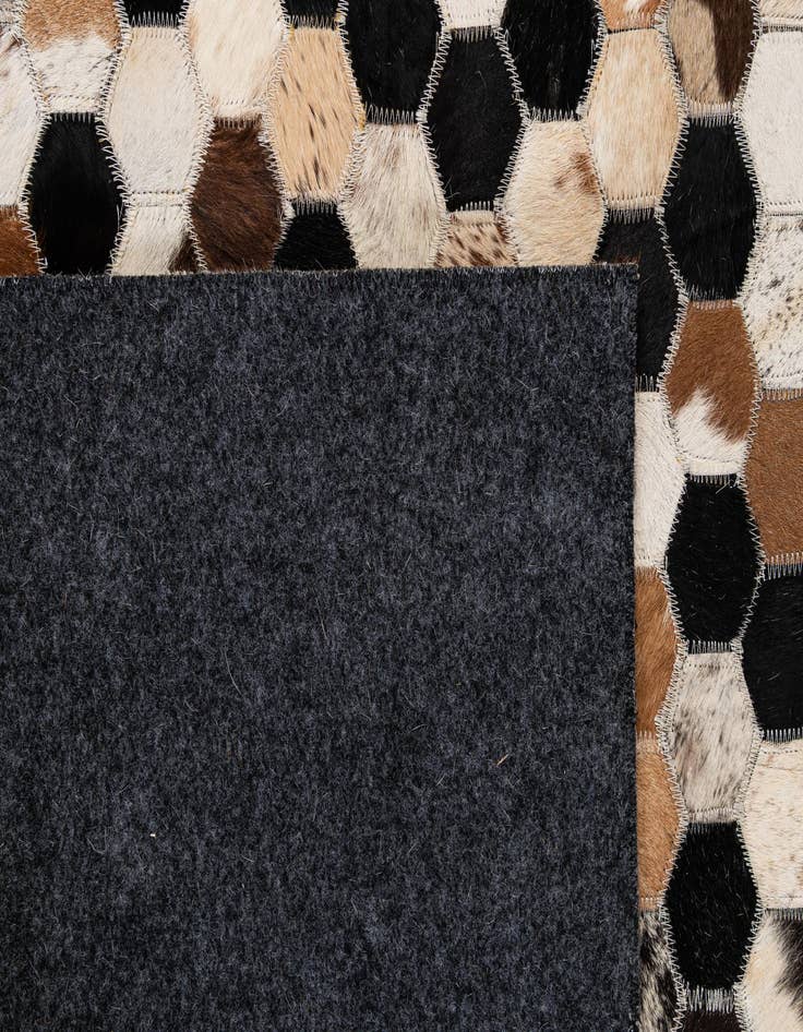 Detail image of 5' 1 x 8' 1 Cowhide - Patchwork Rug