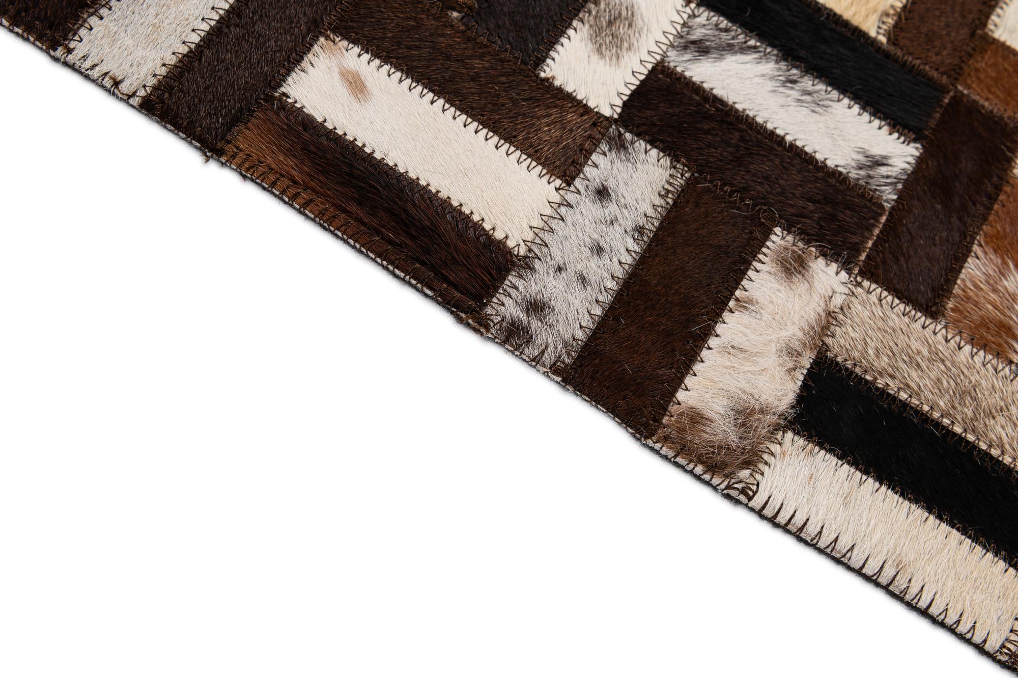 4' 11 x 7' 11 Cowhide - Patchwork Rug