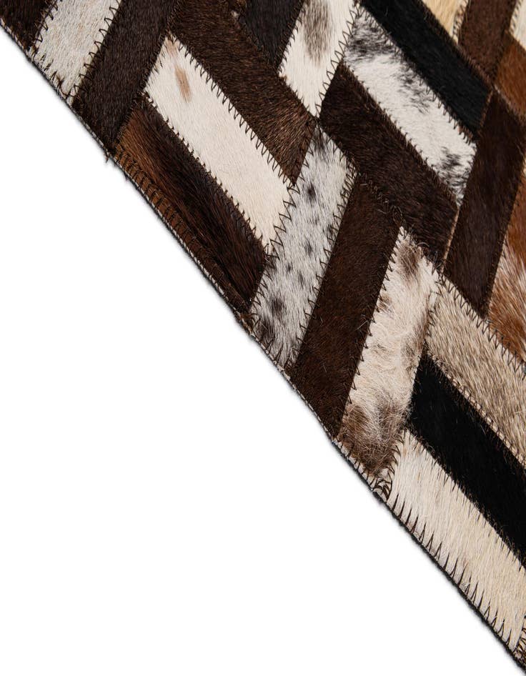 Detail image of 4' 11 x 7' 11 Cowhide - Patchwork Rug