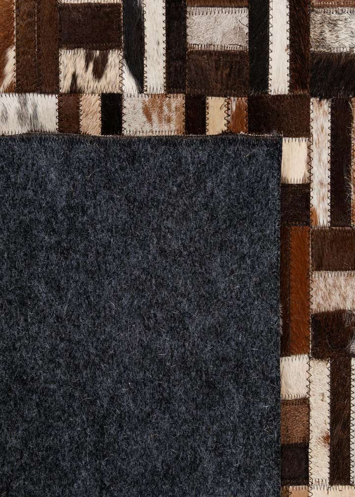 4' 11 x 7' 11 Cowhide - Patchwork Rug