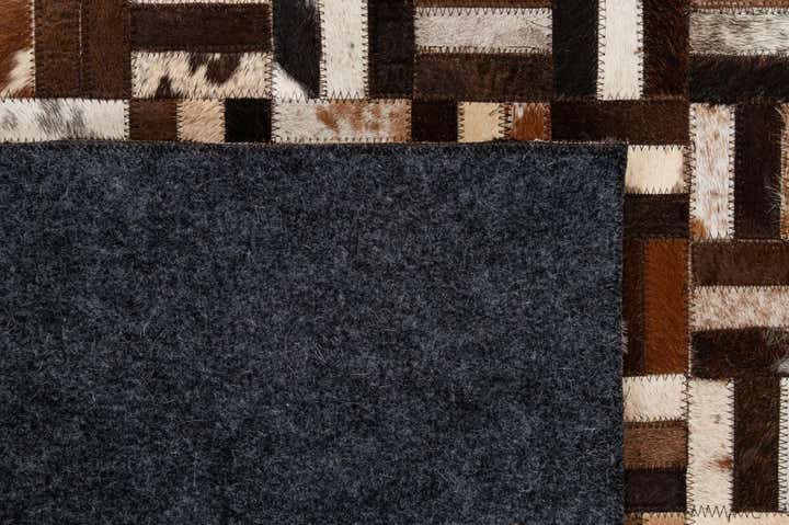 4' 11 x 7' 11 Cowhide - Patchwork Rug