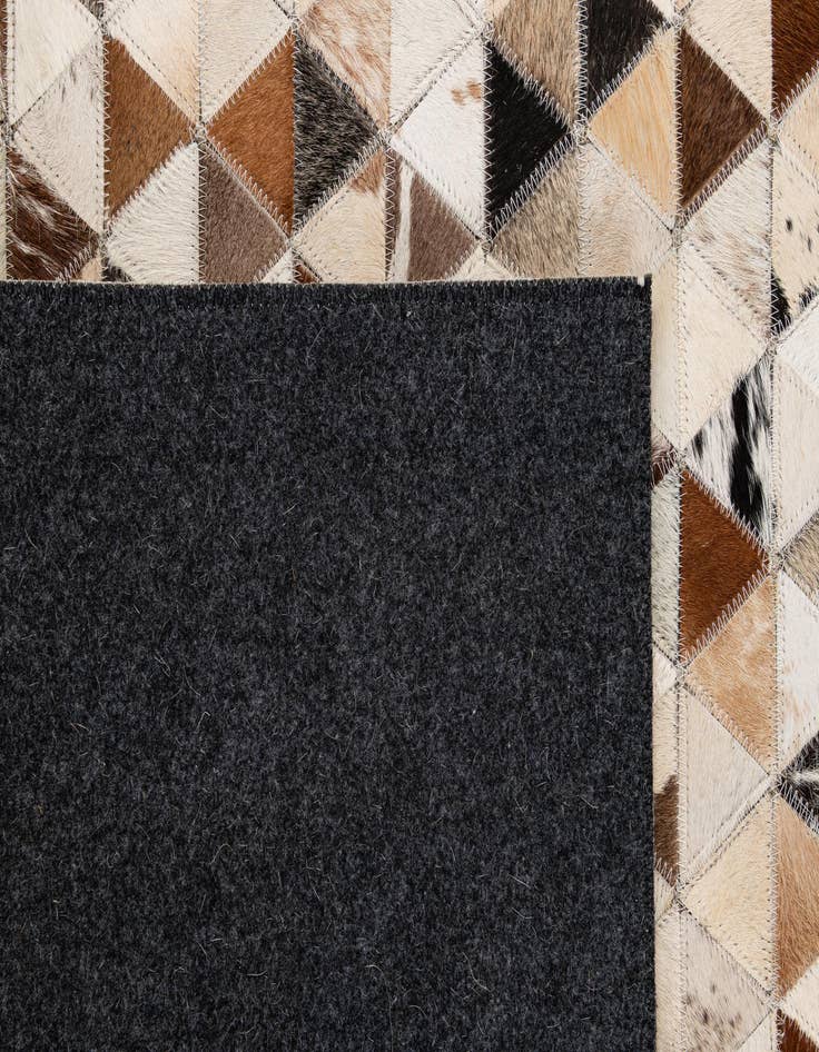 Detail image of 5' 1 x 7' 11 Cowhide - Patchwork Rug
