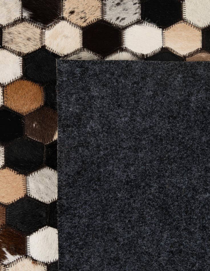 Detail image of 5' 1 x 8' Cowhide - Patchwork Rug