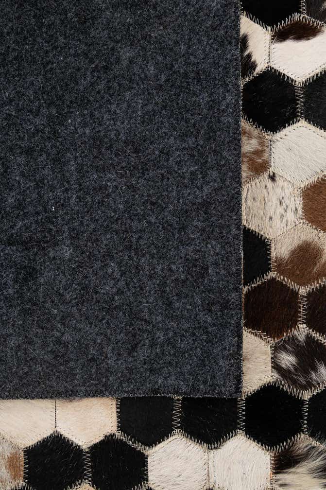 5' 1 x 7' 11 Cowhide - Patchwork Rug