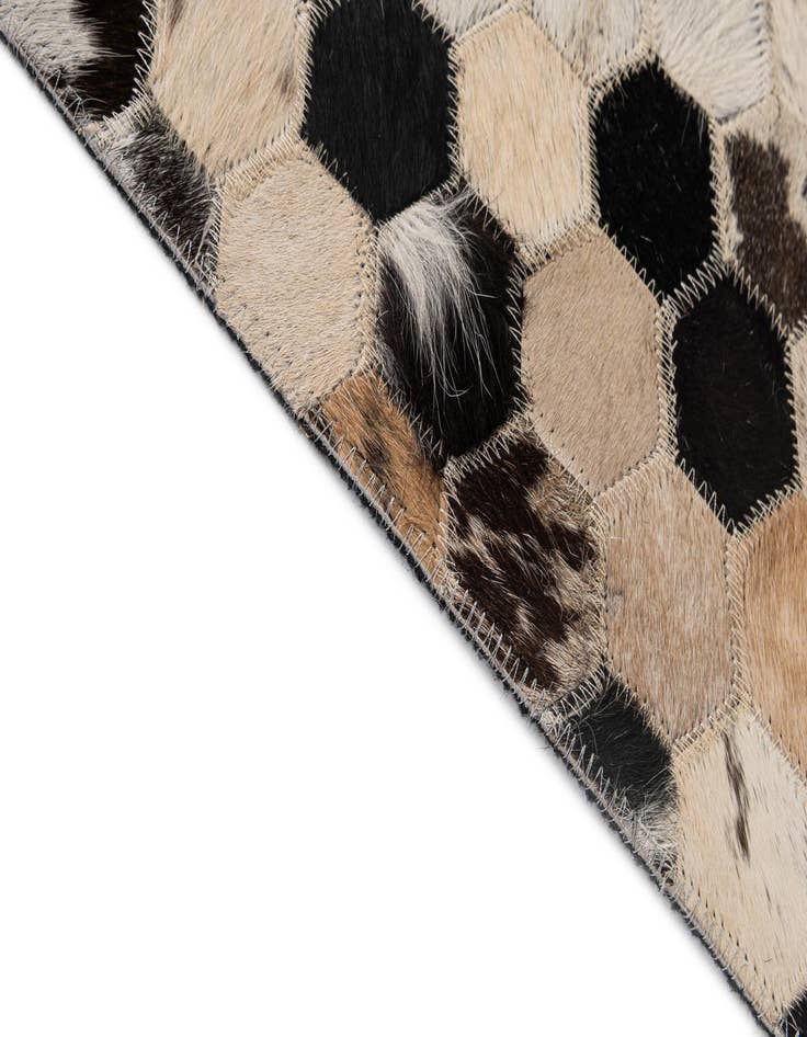 Detail image of 5' 1 x 7' 11 Cowhide - Patchwork Rug