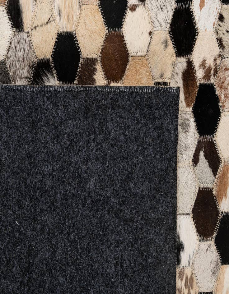Detail image of 5' 1 x 7' 11 Cowhide - Patchwork Rug