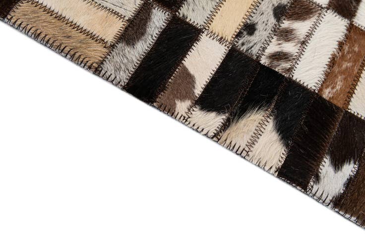 Detail image of 4' 11 x 7' 10 Cowhide - Patchwork Rug