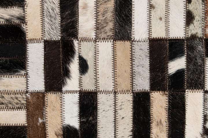 4' 11 x 7' 10 Cowhide - Patchwork Rug