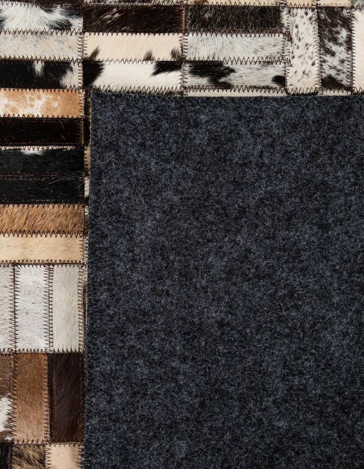 Detail image of 4' 11 x 7' 10 Cowhide - Patchwork Rug