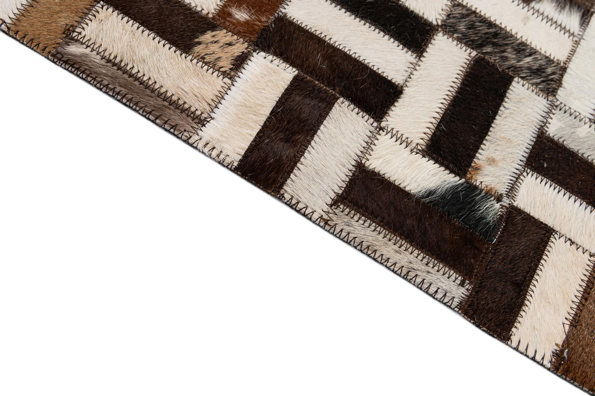 5' 3 x 8' 1 Cowhide - Patchwork Rug