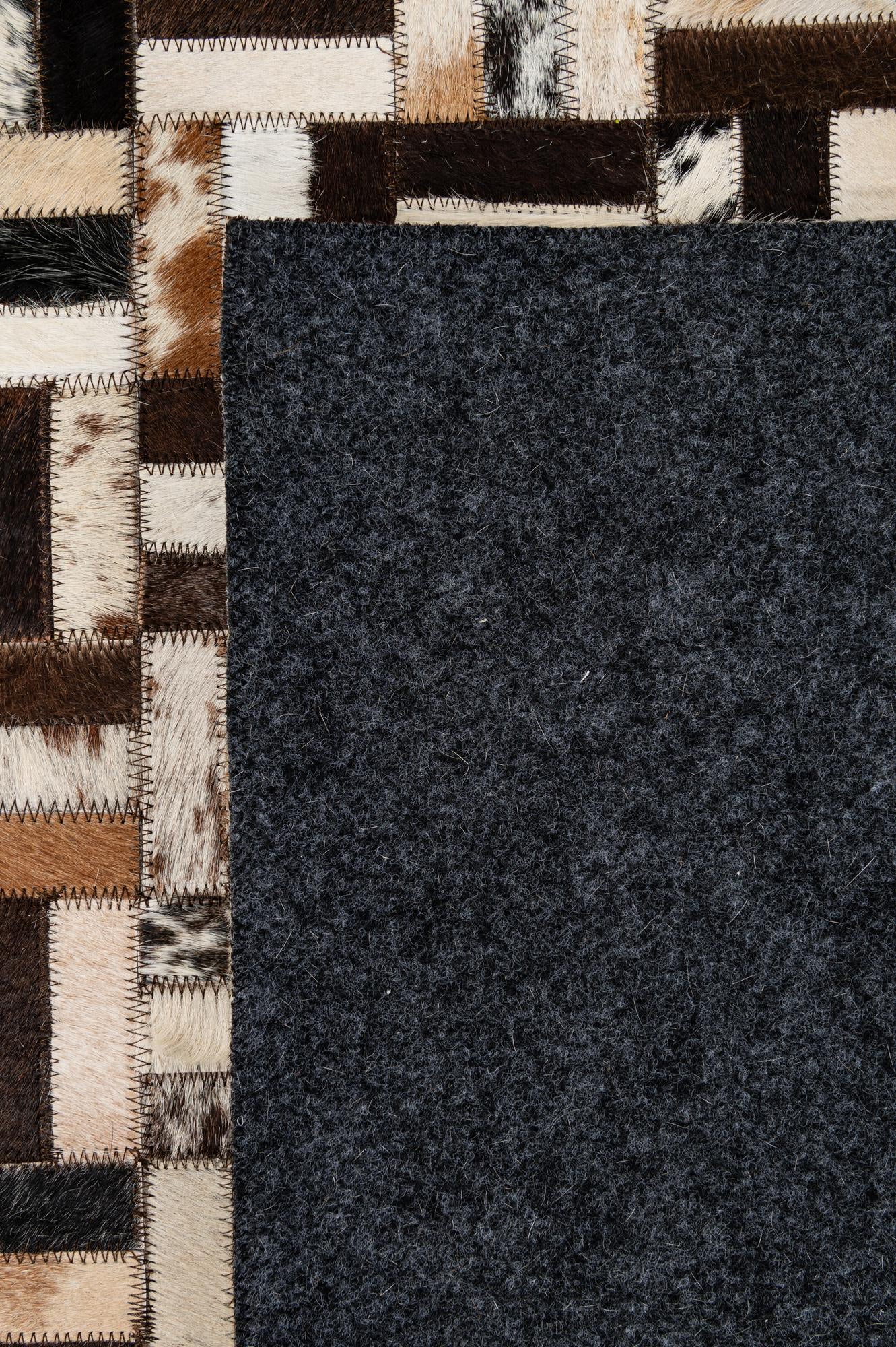 5' 3 x 8' 1 Cowhide - Patchwork Rug