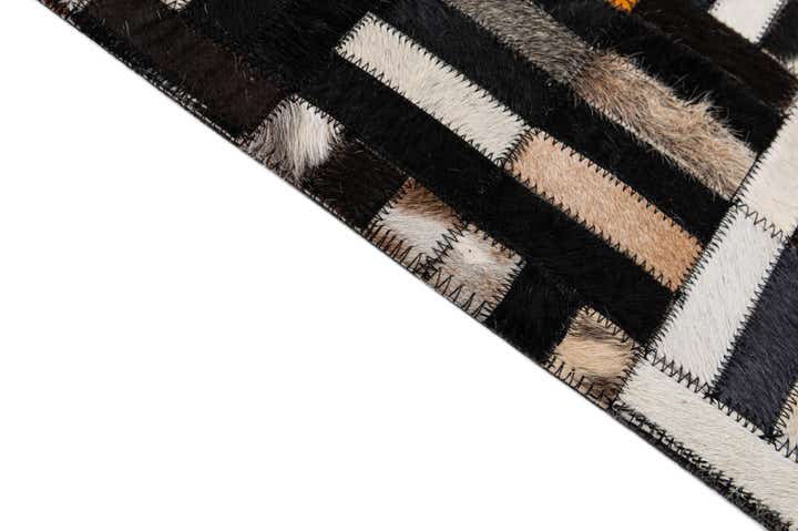 5' 2 x 8' 1 Cowhide - Patchwork Rug