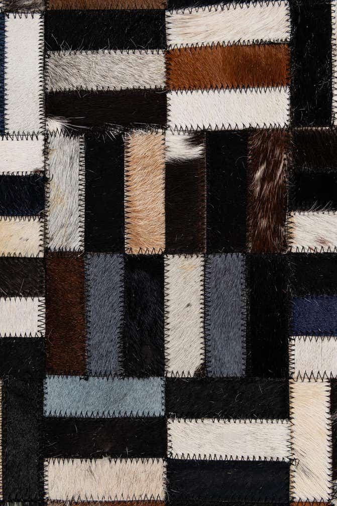 5' 2 x 8' 1 Cowhide - Patchwork Rug