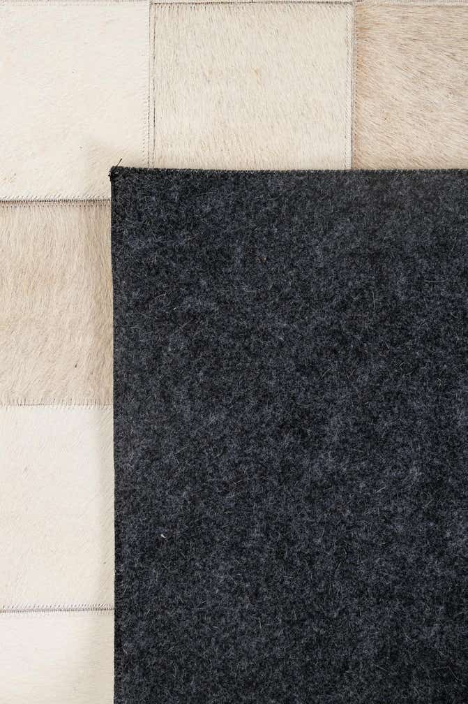 5' 2 x 7' 11 Cowhide - Patchwork Rug