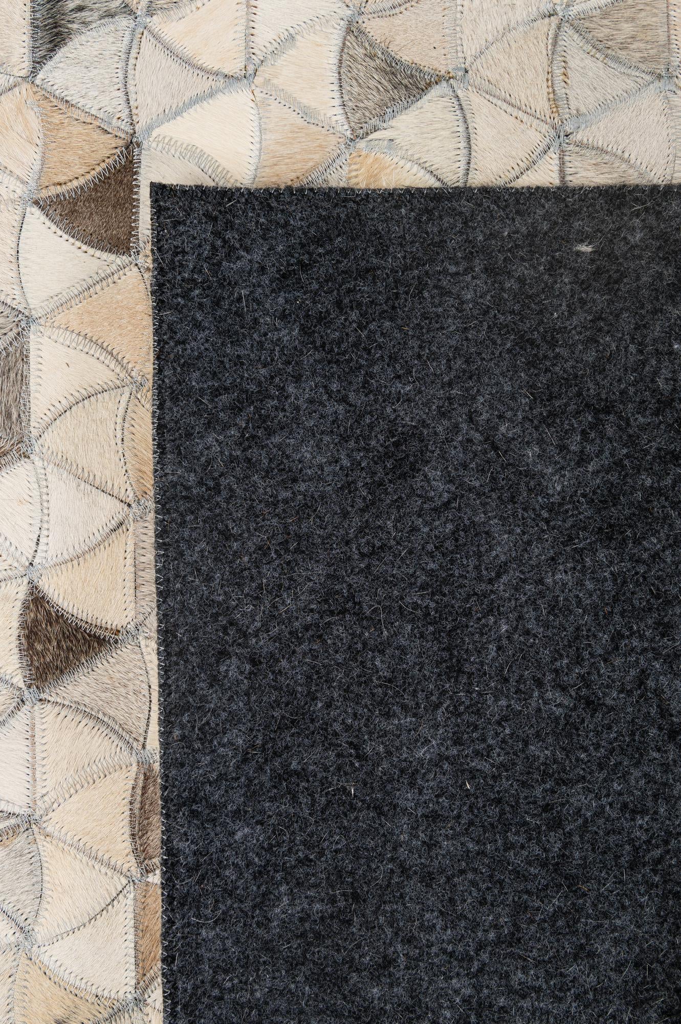 5' x 8' 2 Cowhide - Patchwork Rug