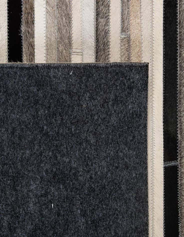 Detail image of 5' 1 x 8' 1 Cowhide - Patchwork Rug