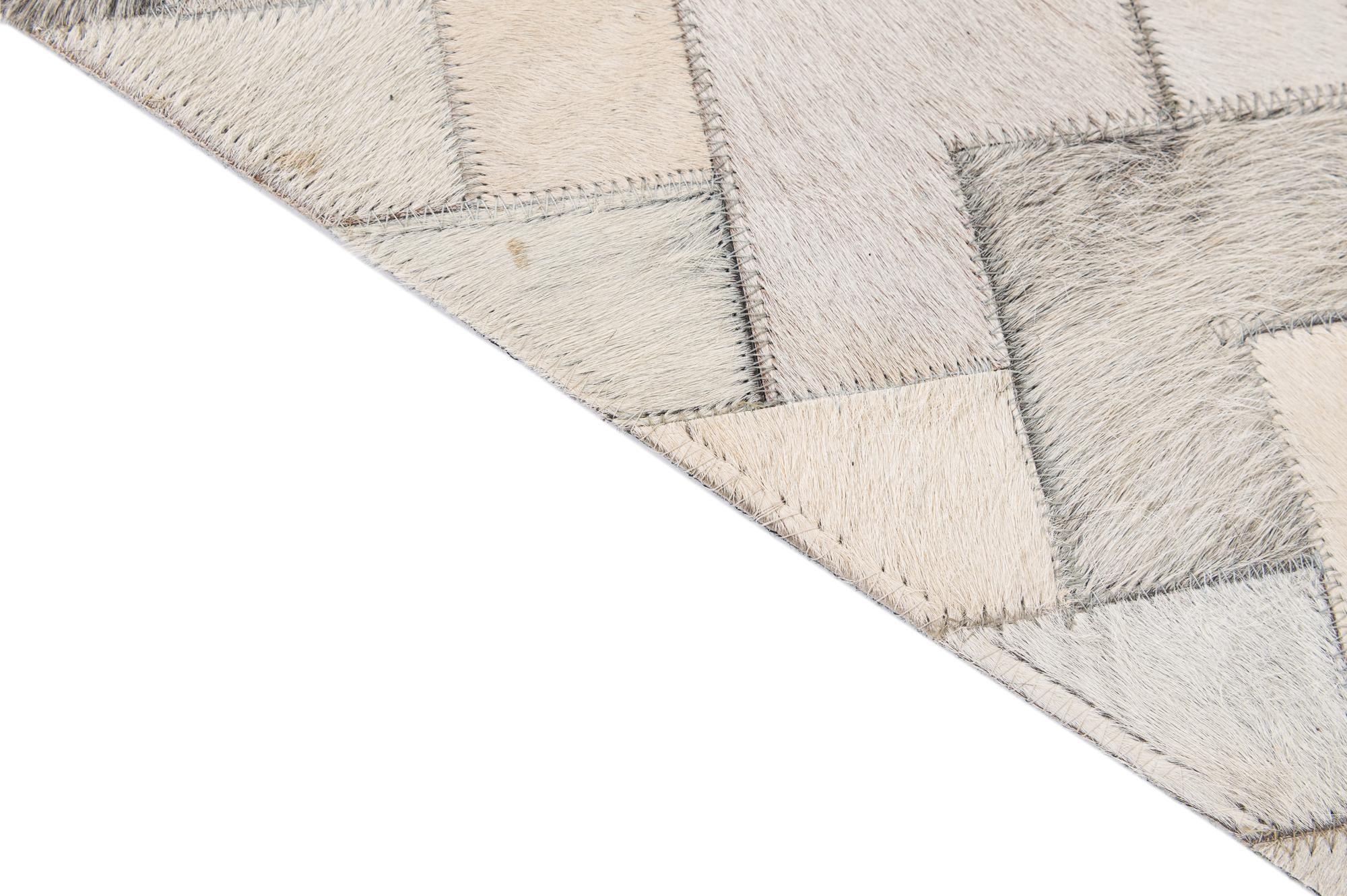 5' 2 x 7' 11 Cowhide - Patchwork Rug