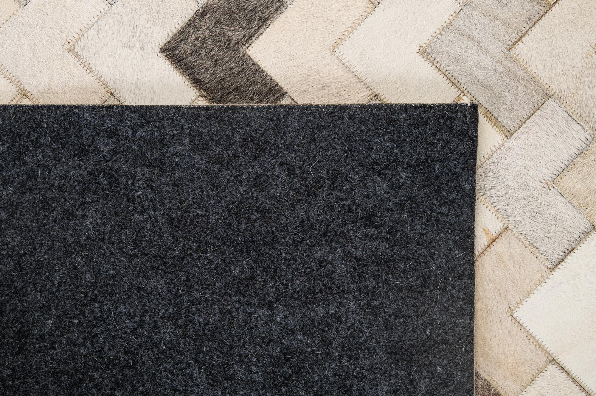 5' 2 x 7' 11 Cowhide - Patchwork Rug