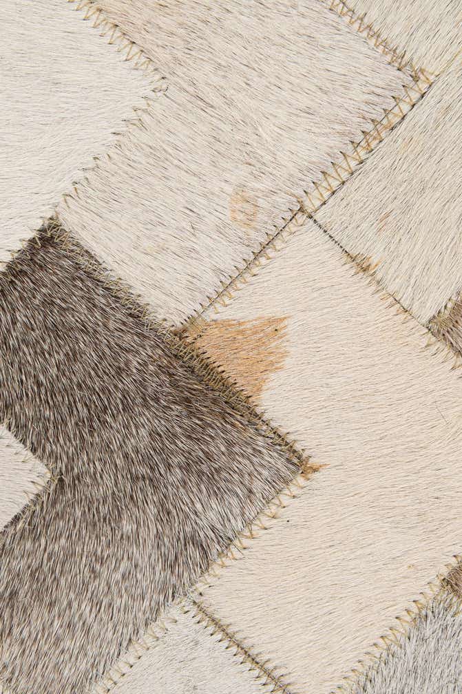 5' 2 x 7' 11 Cowhide - Patchwork Rug