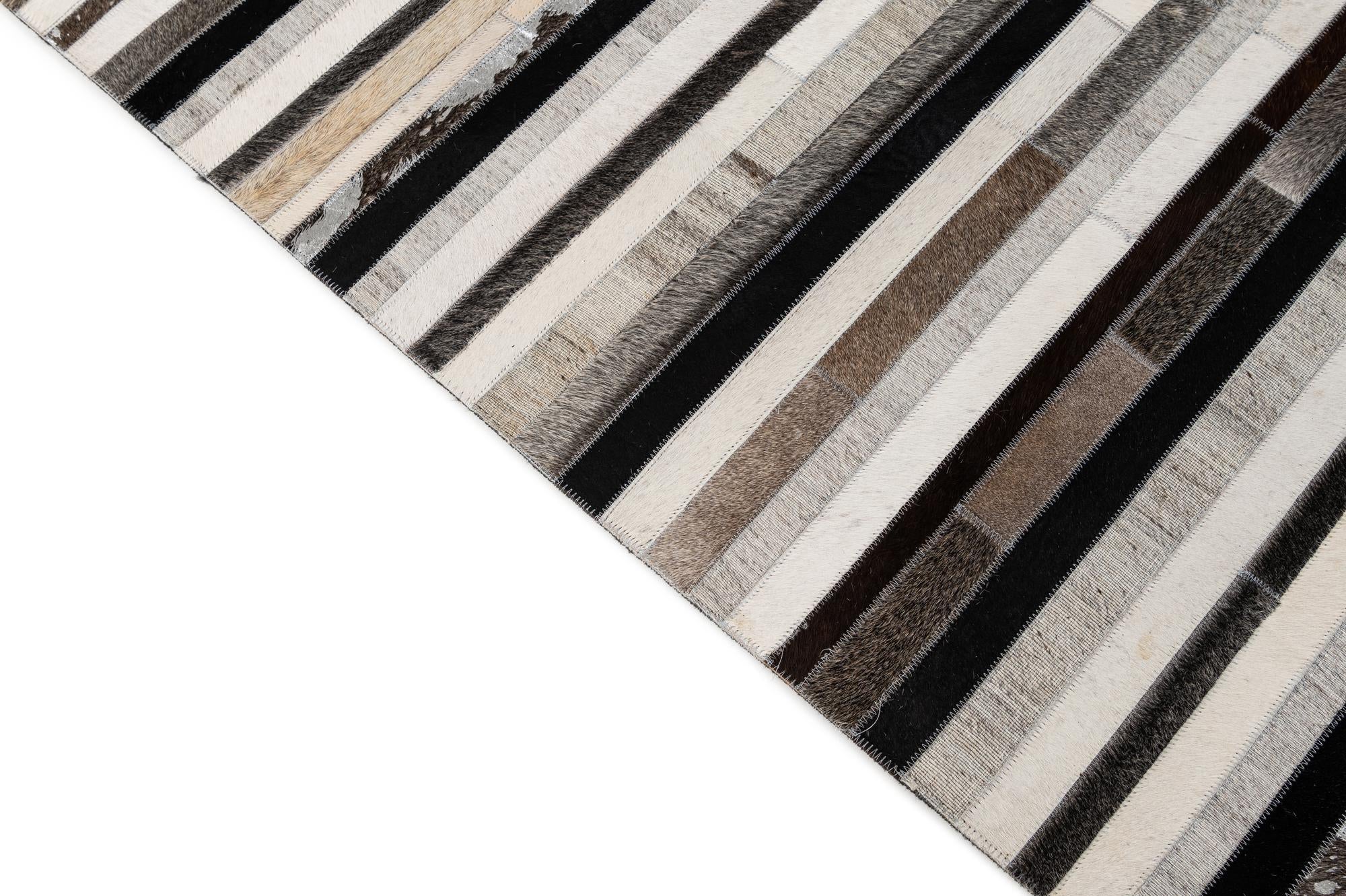 5' x 7' 11 Cowhide - Patchwork Rug