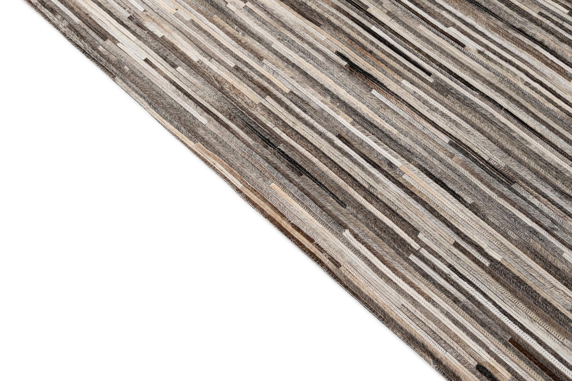 5' 1 x 7' 11 Cowhide - Patchwork Rug