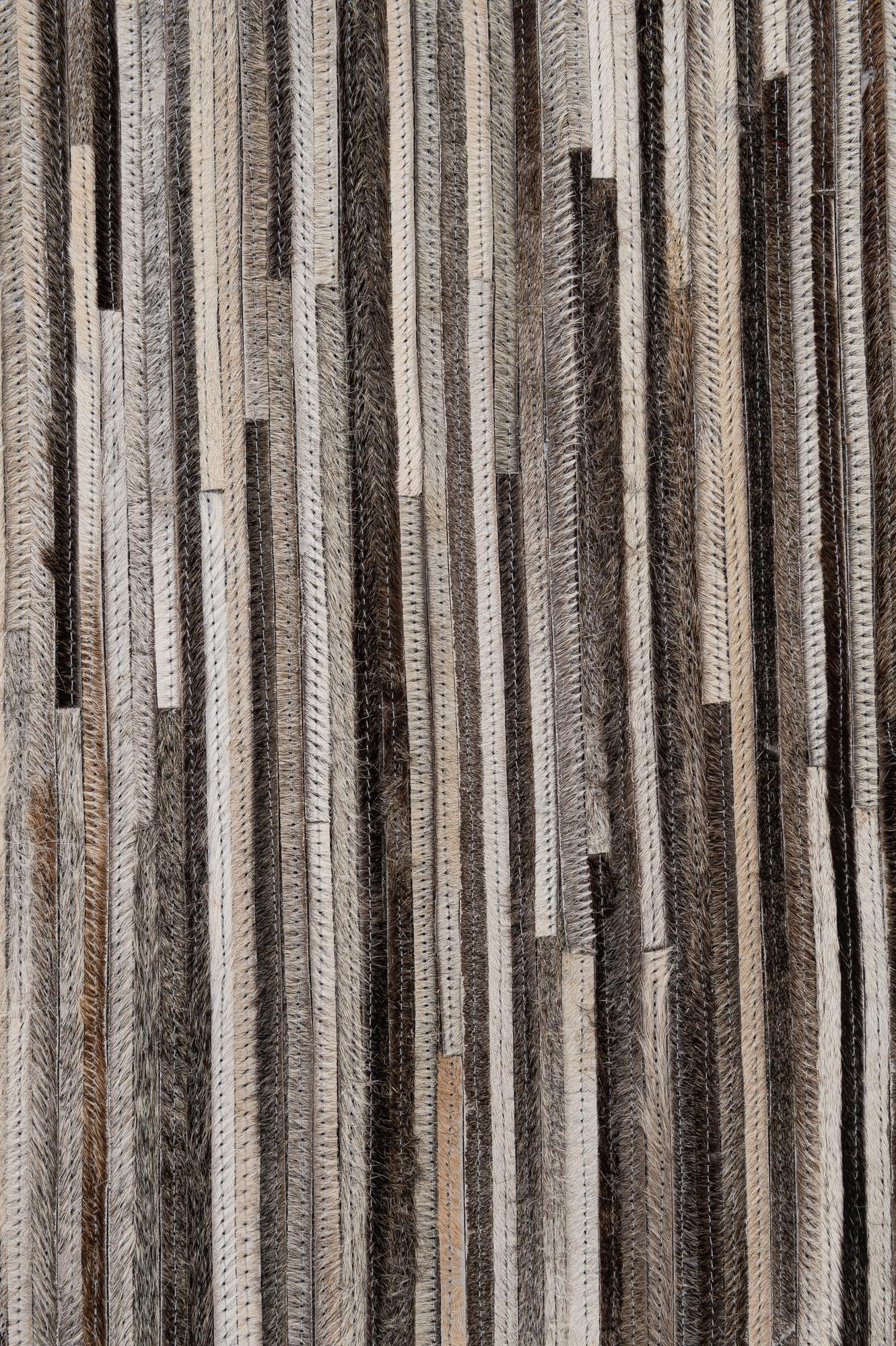 5' 1 x 7' 11 Cowhide - Patchwork Rug