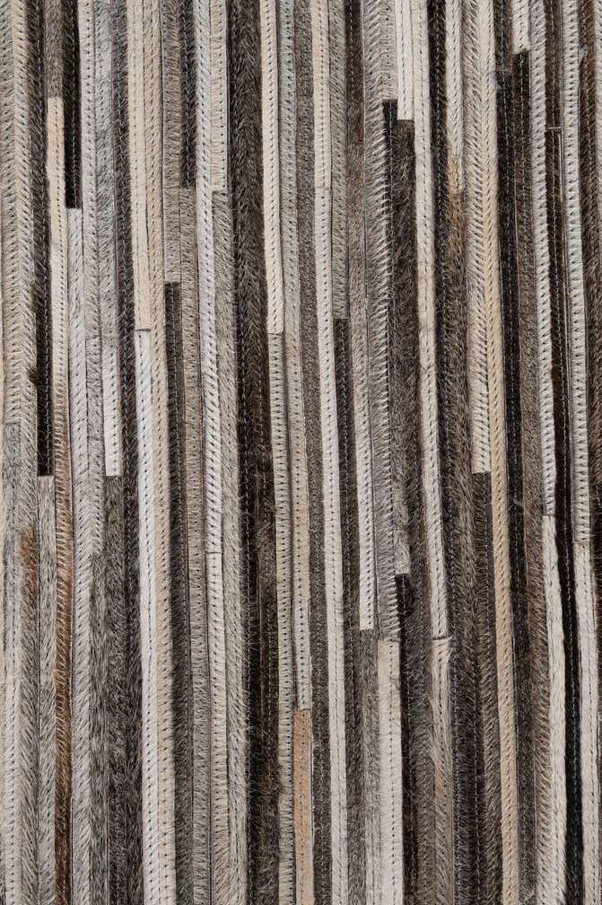 5' 1 x 7' 11 Cowhide - Patchwork Rug
