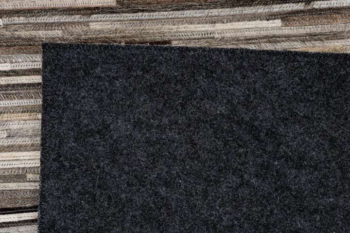 5' 1 x 7' 11 Cowhide - Patchwork Rug