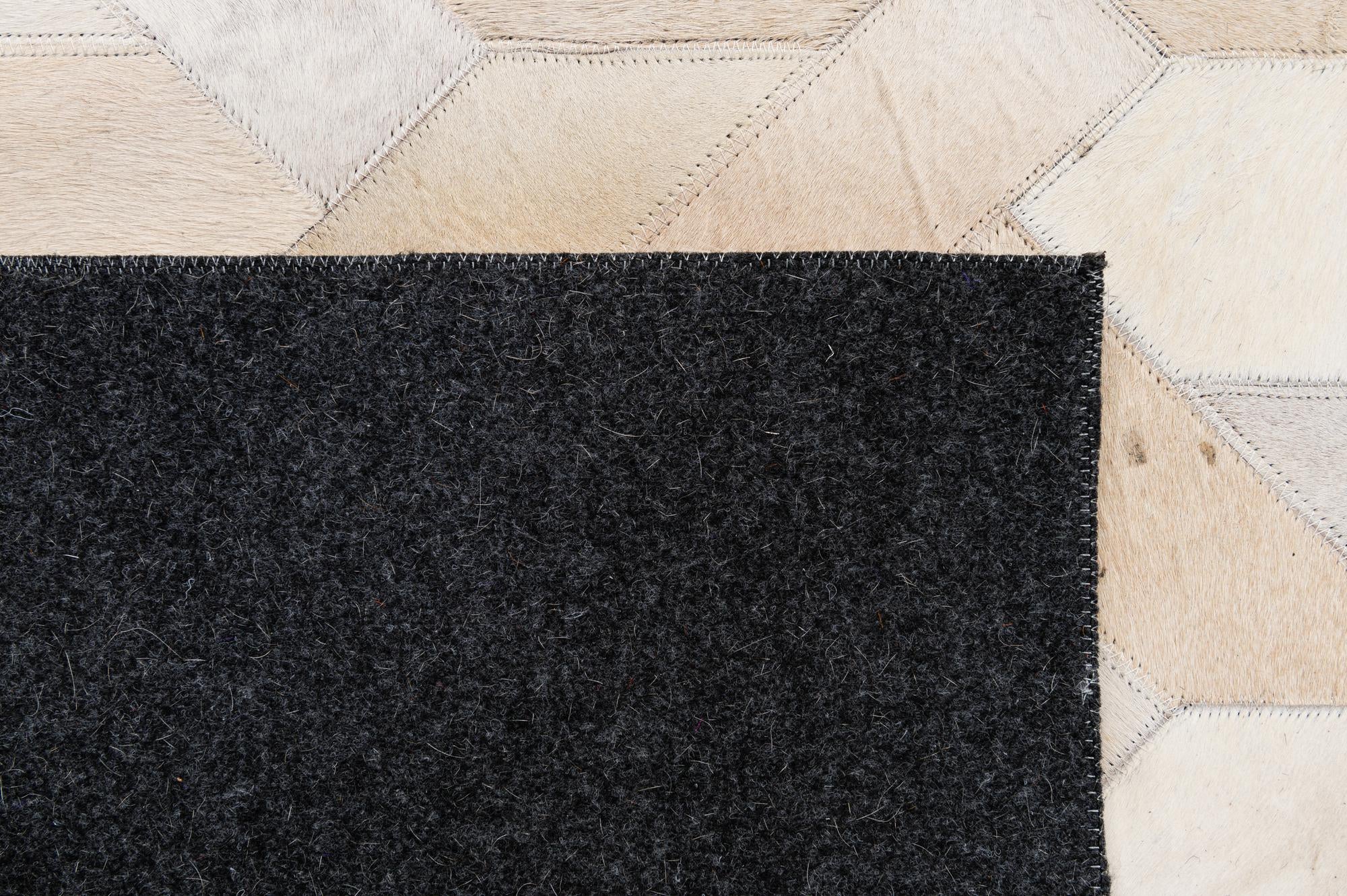 5' 1 x 7' 11 Cowhide - Patchwork Rug