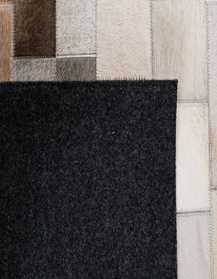 Detail image of 5' 1 x 8' Cowhide - Patchwork Rug