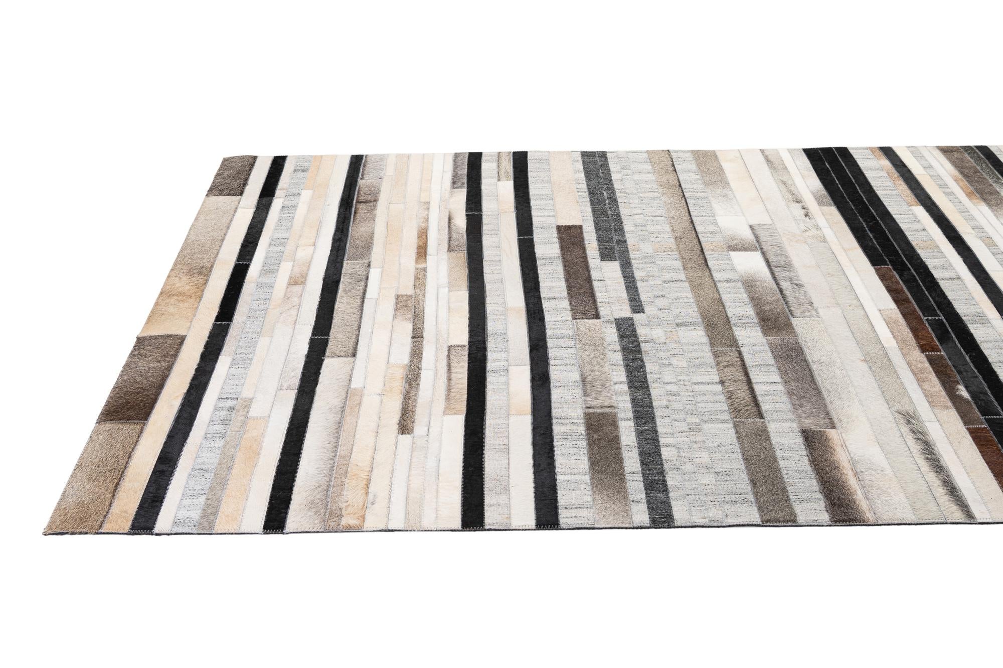 5' 1 x 8' 1 Cowhide - Patchwork Rug
