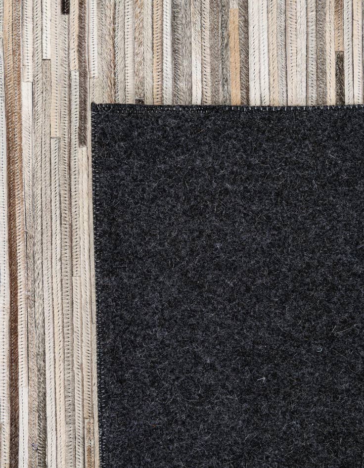 Detail image of 5' 1 x 8' 1 Cowhide - Patchwork Rug