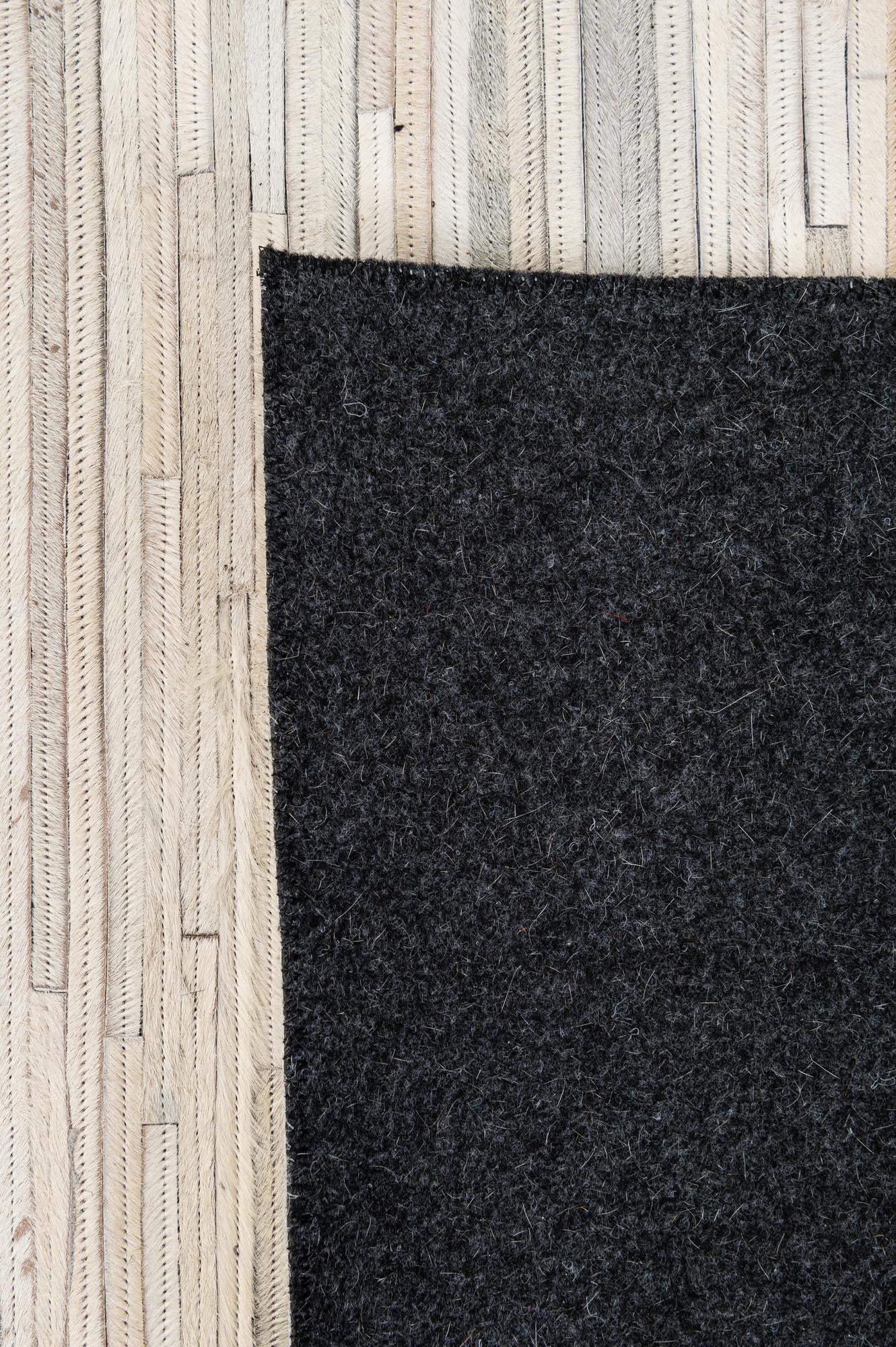 5' 1 x 8' Cowhide - Patchwork Rug