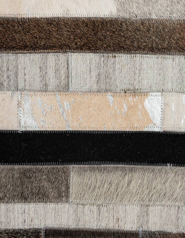 Detail image of 5' 1 x 8' Cowhide - Patchwork Rug