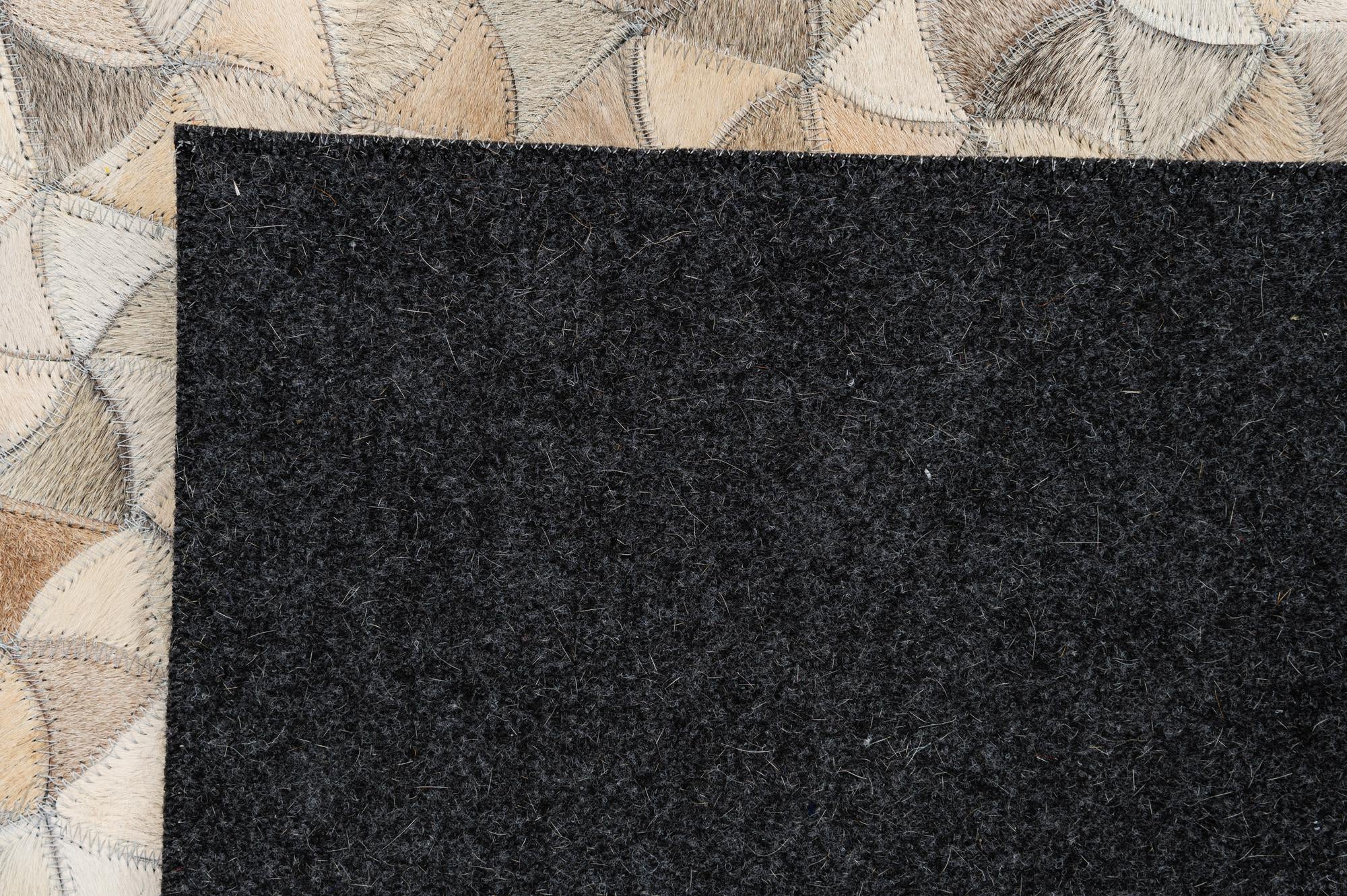 4' 11 x 7' 11 Cowhide - Patchwork Rug