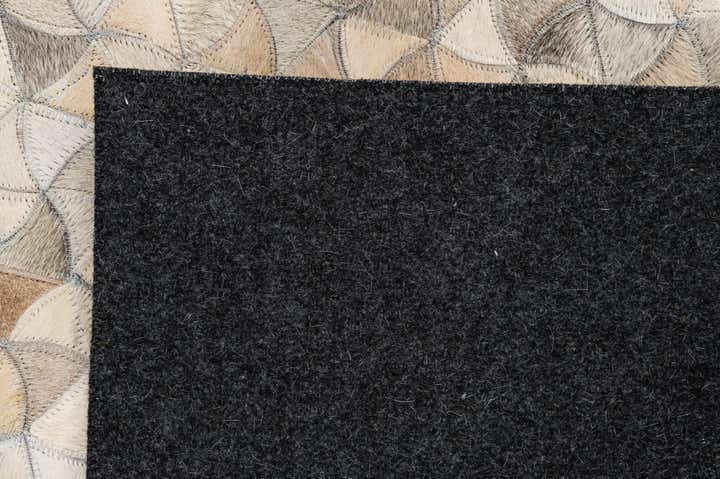 4' 11 x 7' 11 Cowhide - Patchwork Rug
