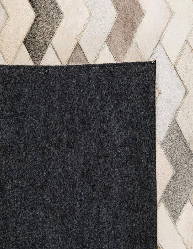Detail image of 5' 2 x 8' Cowhide - Patchwork Rug