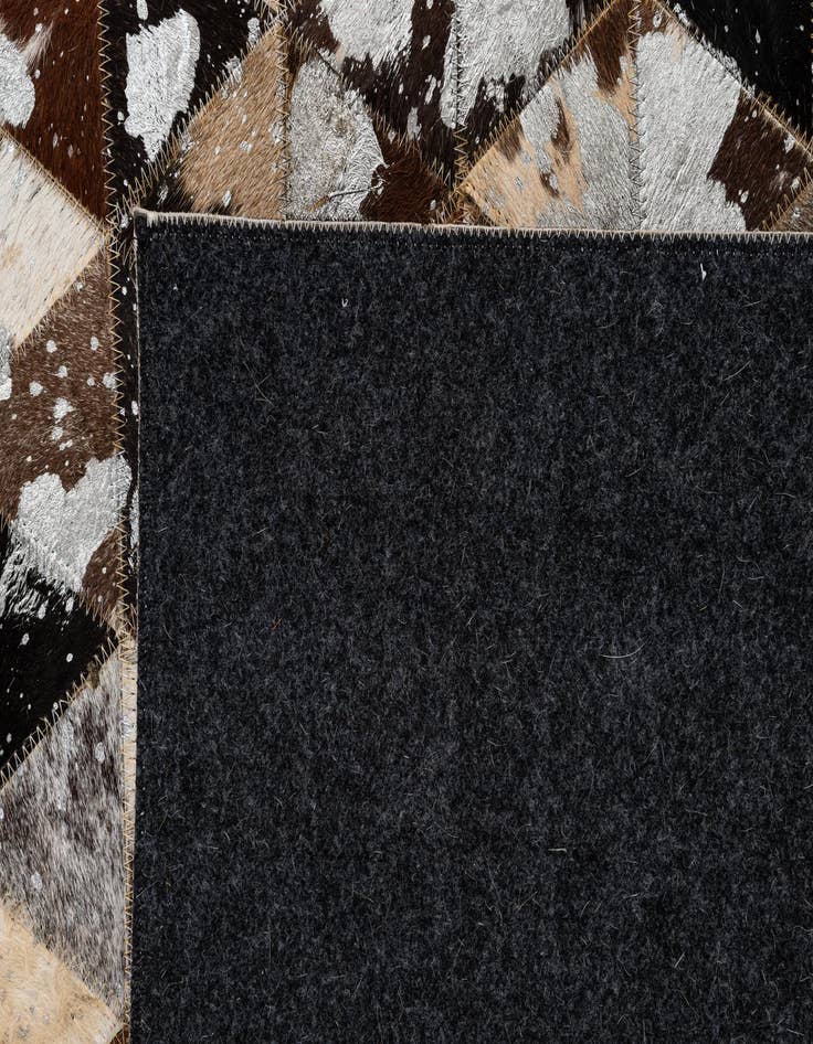 Detail image of 4' 11 x 8' Cowhide - Patchwork Rug