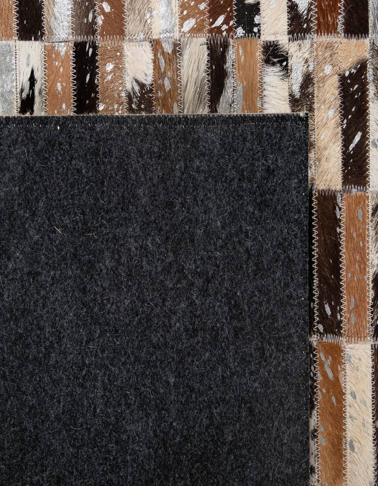 Detail image of 5' x 7' 11 Cowhide - Patchwork Rug