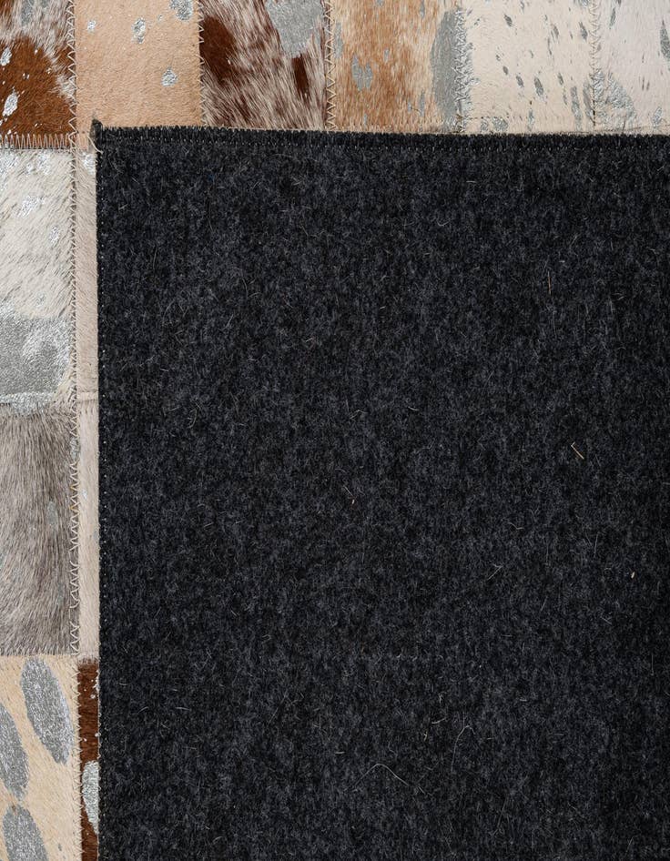 Detail image of 5' 2 x 8' Cowhide - Patchwork Rug