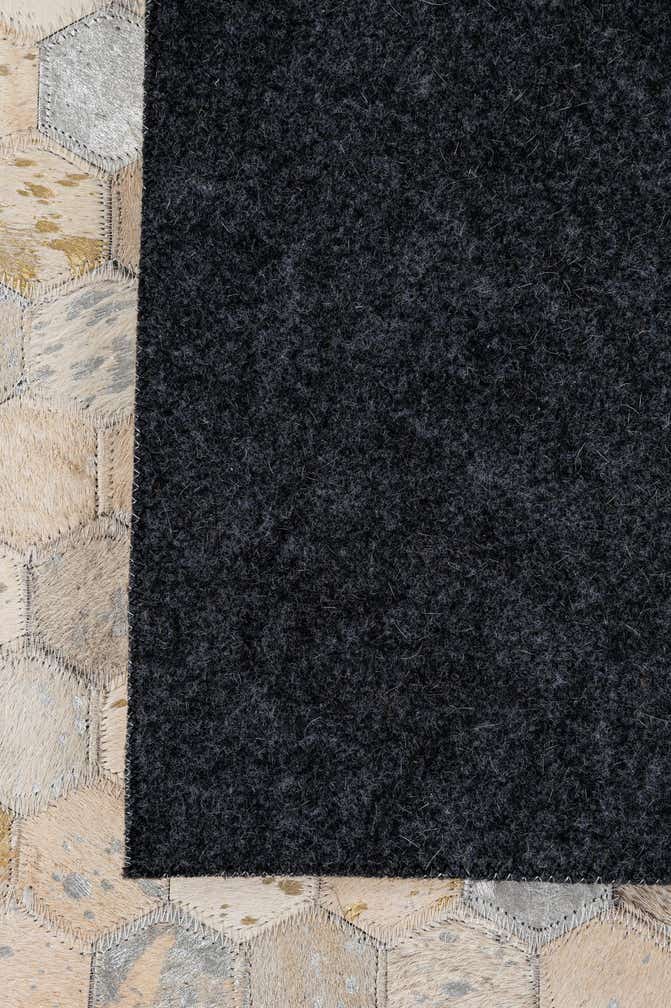 5' 1 x 7' 10 Cowhide - Patchwork Rug