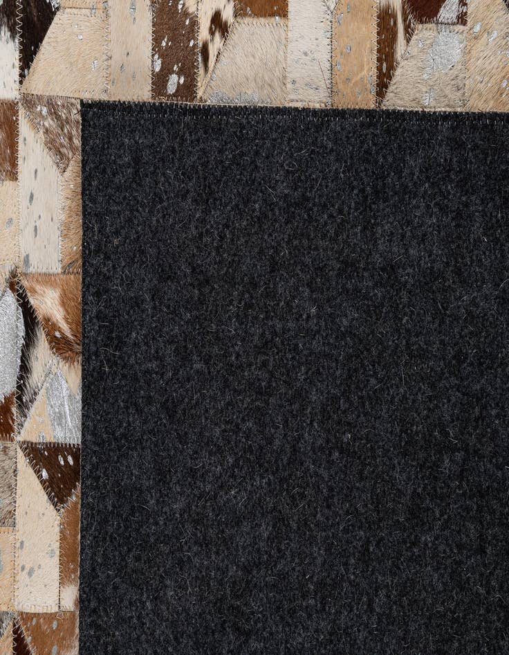 Detail image of 5' 1 x 8' Cowhide - Patchwork Rug