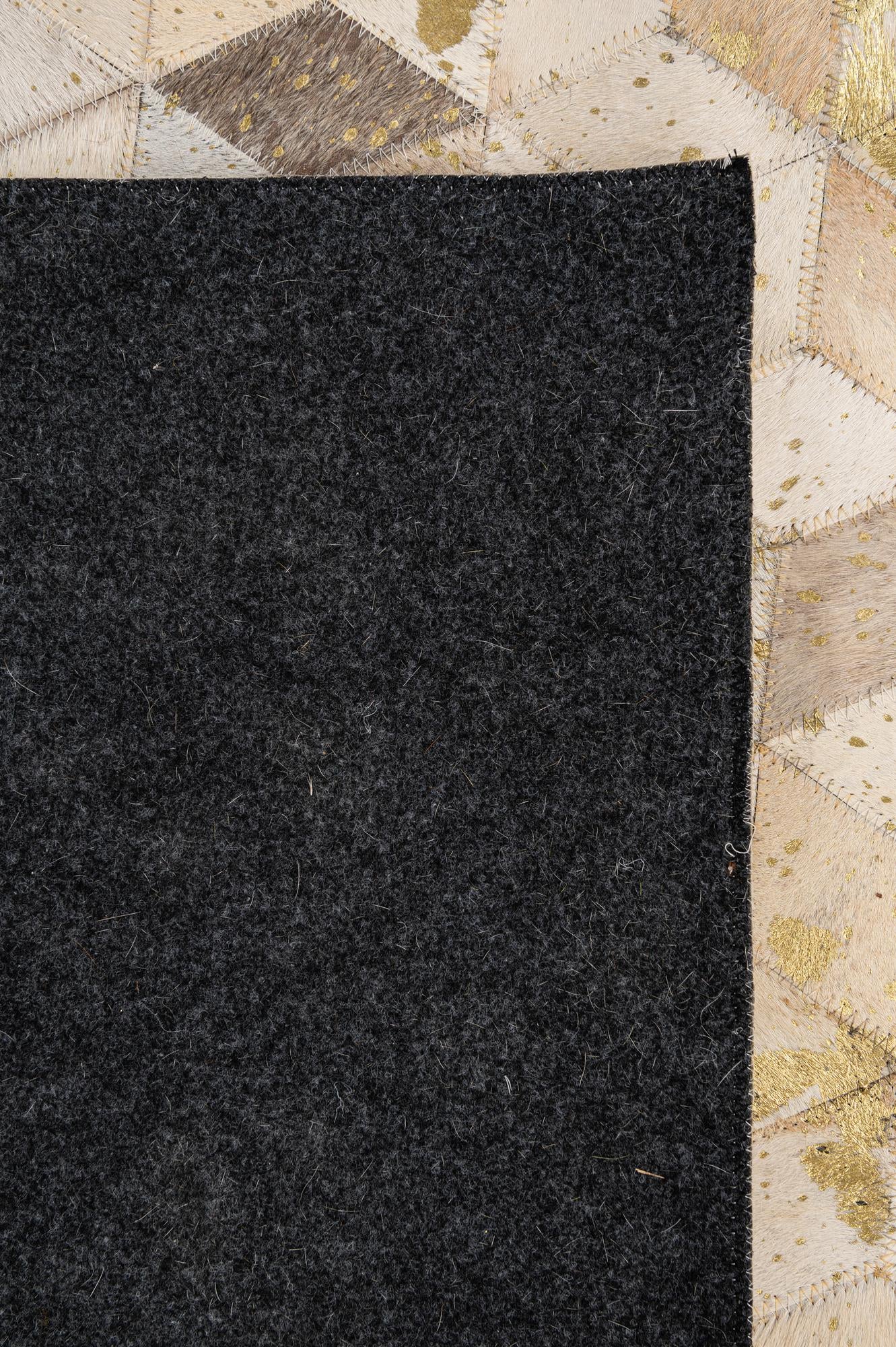5' 3 x 8' 1 Cowhide - Patchwork Rug