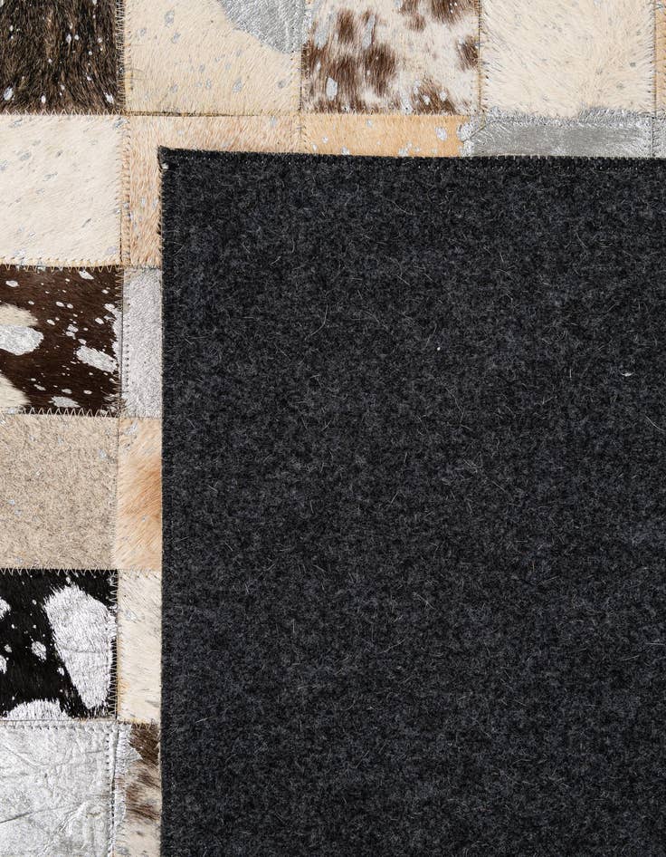Detail image of 5' x 7' 11 Cowhide - Patchwork Rug